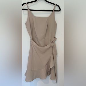 Spaghetti strap dress with wrap around side tie.